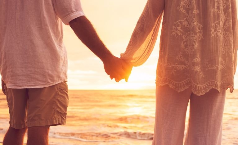 Couple holding hands